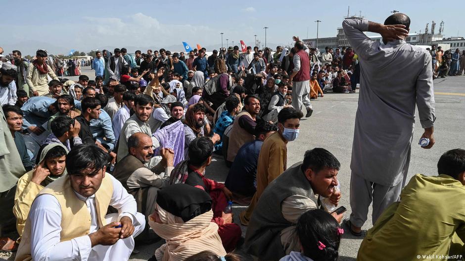 Afghans await evacuation at the Kabul airport. Photo: AFP